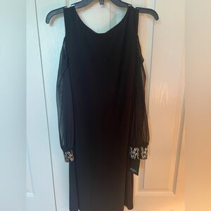 Marina , size 6 Black dress. Never worn with tags.